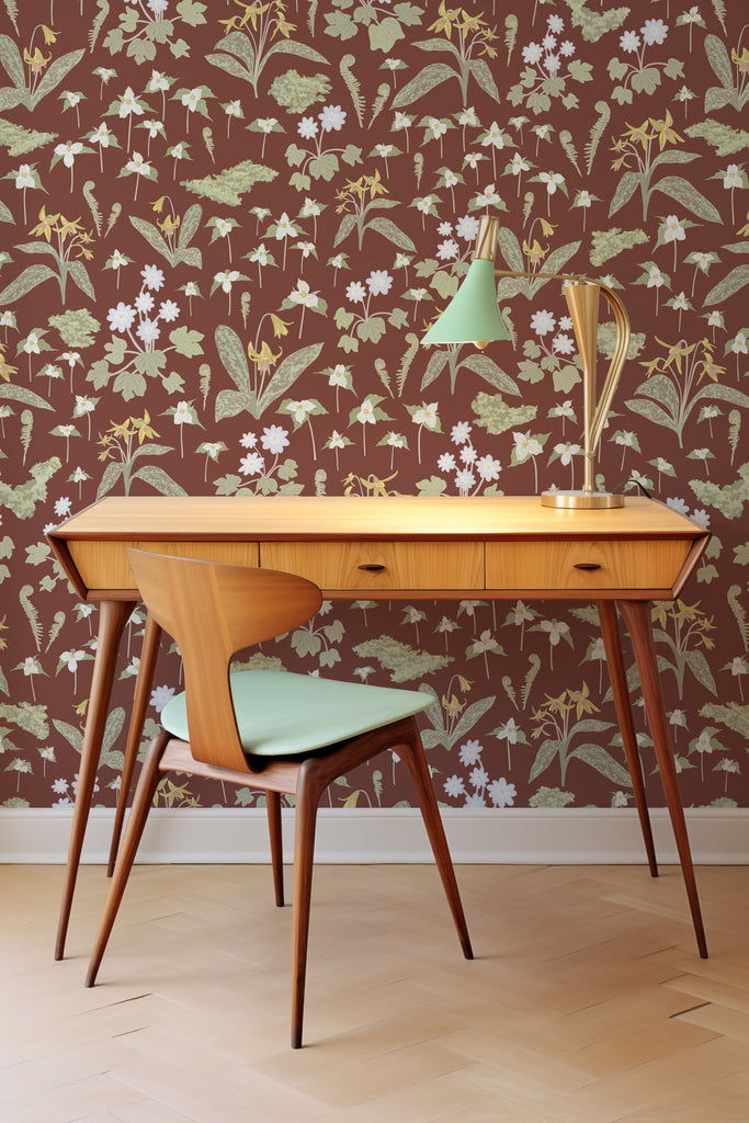 Chic office setup with a mid-century desk and chair against the Forest Blooms White wallpaper adorned with early spring flowers and ferns