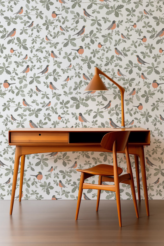 A modern workspace brightened by the Robin Silvery Grey wallpaper, where the cheerful robin motifs complement the clean lines of a mid-century desk.