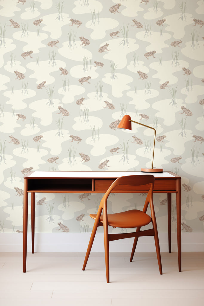 A sleek workspace featuring the Spring Peeper Cream wallpaper, complemented by a mid-century modern desk and chair