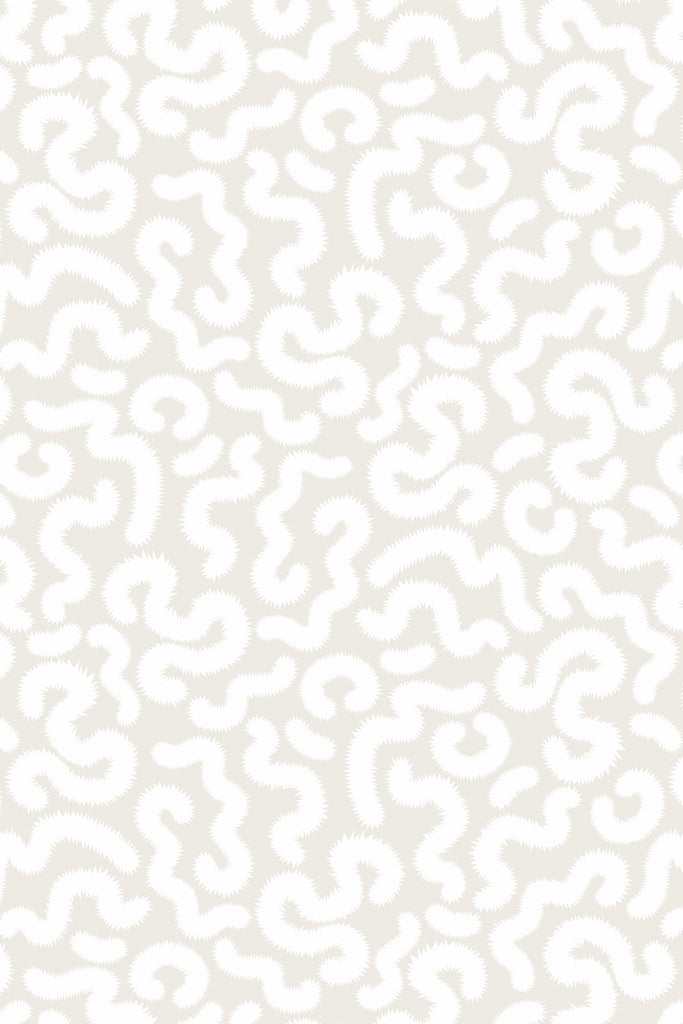 Kate Golding's Spring Pop Parchment wallpaper with pink tulip lamp on side table, showcasing a chic and harmonious blend of design and color for modern interiors